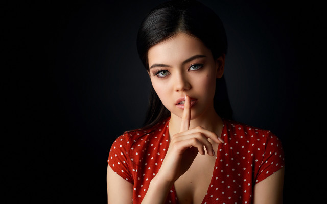 Woman red polka dot shushing free wallpaper for desktop - medium preview image