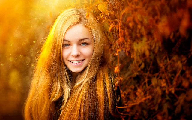 Woman blonde hair smiling autumn free wallpaper for desktop - medium preview image