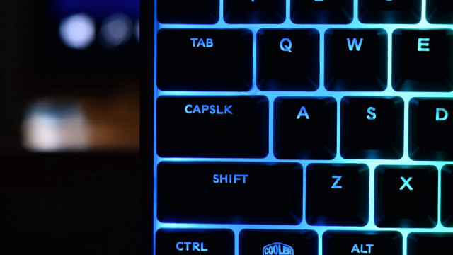 Keyboard blue light blurry background free wallpaper for desktop - medium preview image