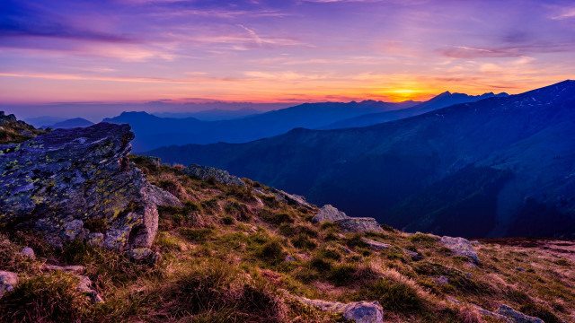 Mountain sunset rocky field cityscape free wallpaper for desktop - medium preview image