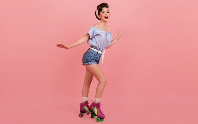 Woman rollerblading pink background fashion free wallpaper for desktop - medium preview image