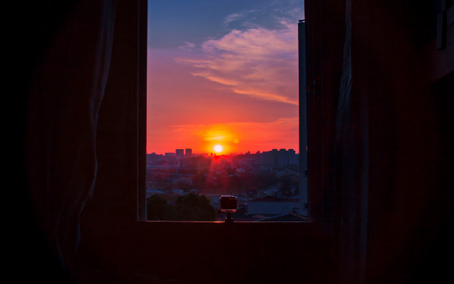 Sunset cityscape mountain reflection orange free wallpaper for desktop - medium preview image