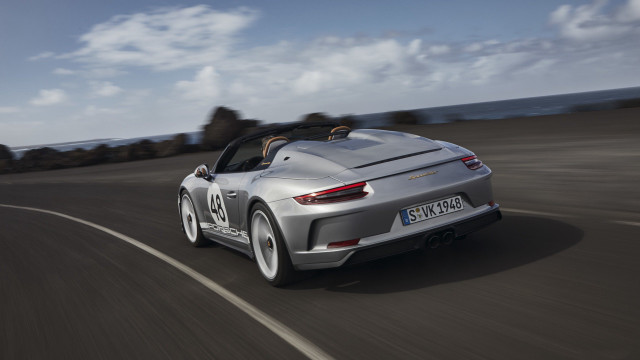 Silver sports car ocean cliff #2 free wallpaper for desktop - medium preview image