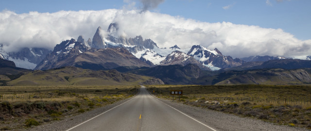 Long road mountains clouds sign free wallpaper for desktop - medium preview image