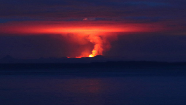Volcano smoke red glow horizon free wallpaper for desktop - medium preview image