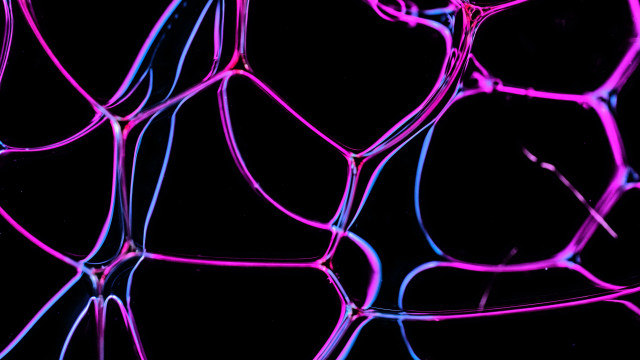 Purple cell phone macro shiny free wallpaper for desktop - medium preview image