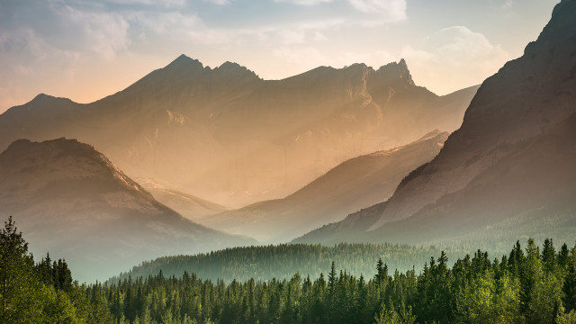 Mountain range forest hazy sky free wallpaper for desktop - medium preview image
