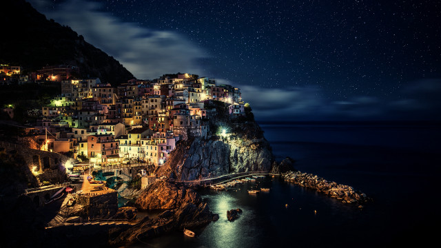 Cliff village night ocean bridge free wallpaper for desktop - medium preview image