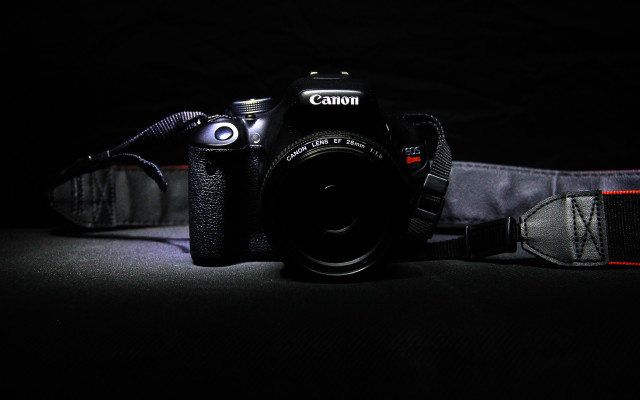 Camera strap on macro dark free wallpaper for desktop - medium preview image