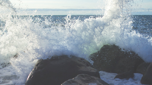 Wave rocks ocean beach sky free wallpaper for desktop - medium preview image