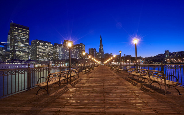 Wooden pier city lights night free wallpaper for desktop - medium preview image