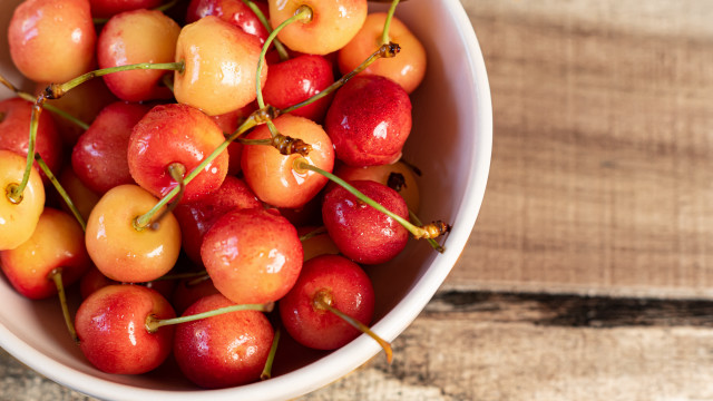 Bowl cherries wooden table spoon free wallpaper for desktop - medium preview image