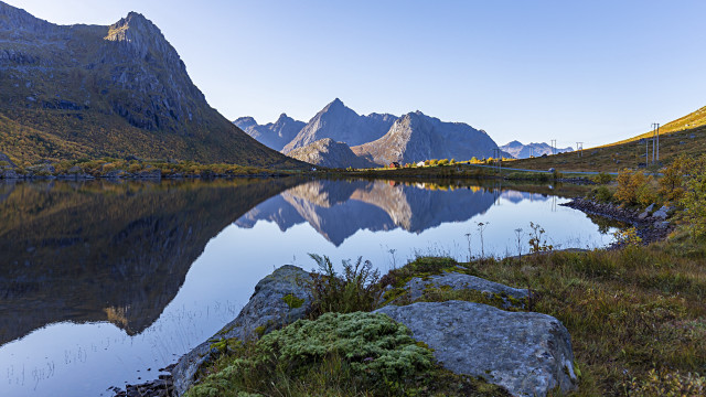 Mountain lake grass rocks blue free wallpaper for desktop - medium preview image