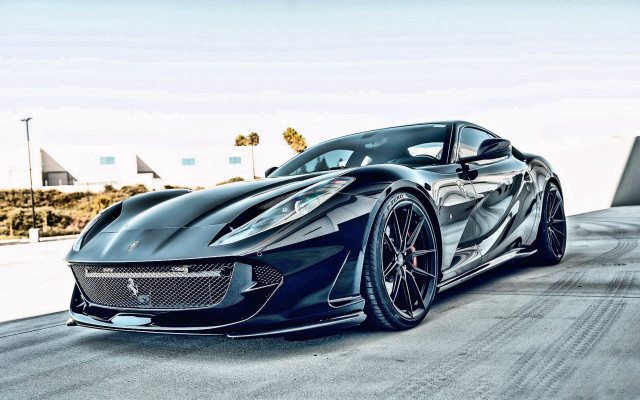 Black sports car road ramp free wallpaper for desktop - medium preview image