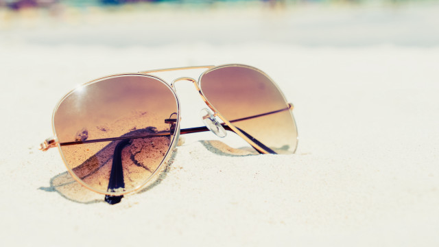 Sunglasses beach ocean sun reflection free wallpaper for desktop - medium preview image