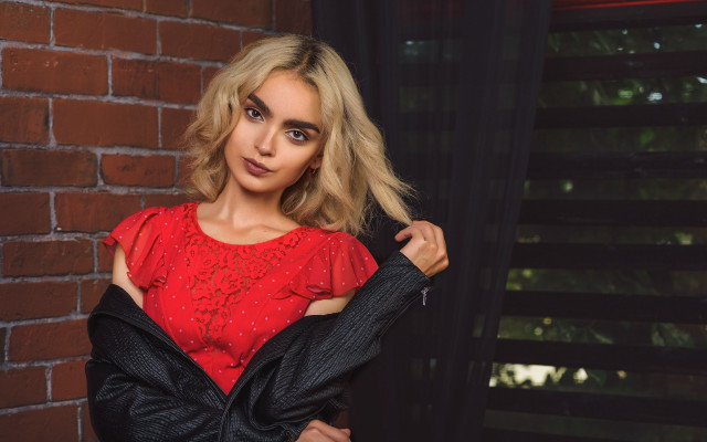 Woman red top hands hips free wallpaper for desktop - medium preview image