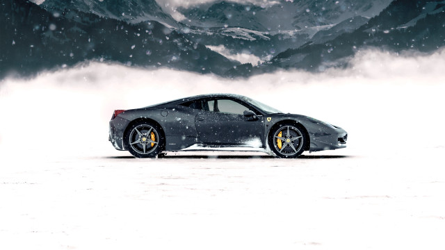 Sports car snowy field mountains free wallpaper for desktop - medium preview image