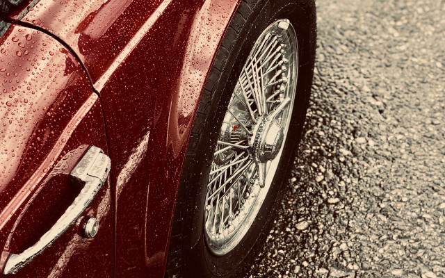 Red car rainy tires night free wallpaper for desktop - medium preview image