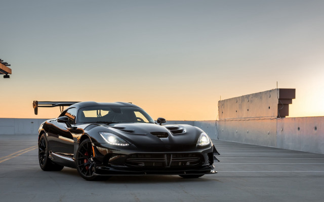 Black sports car sunset crane free wallpaper for desktop - medium preview image