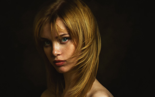 Woman longblondehair blueeyes serious portrait free wallpaper for desktop - medium preview image