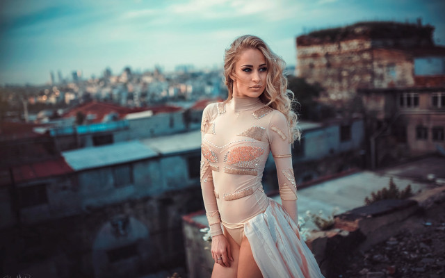 Woman white dress rooftop cityscape free wallpaper for desktop - medium preview image