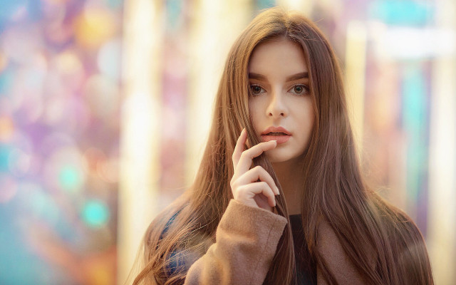 Elina karimova serious portrait bokeh free wallpaper for desktop - medium preview image