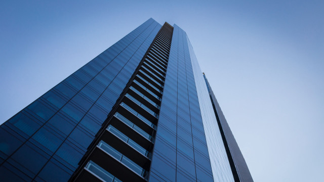 Tall building blue sky clouds #4 free wallpaper for desktop - medium preview image
