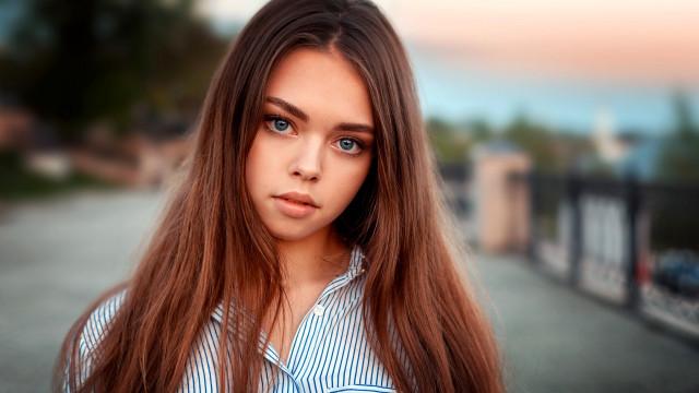 Serious asian woman longhair fence free wallpaper for desktop - medium preview image