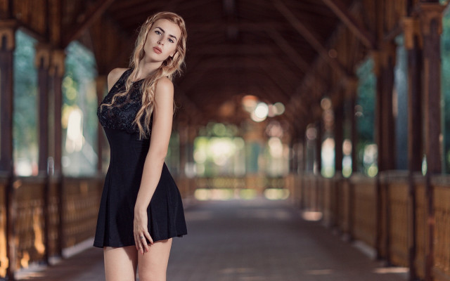 Woman black dress posing arcade free wallpaper for desktop - medium preview image