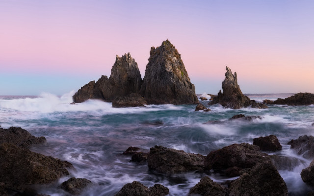 Rocky beach waves pink sky free wallpaper for desktop - medium preview image