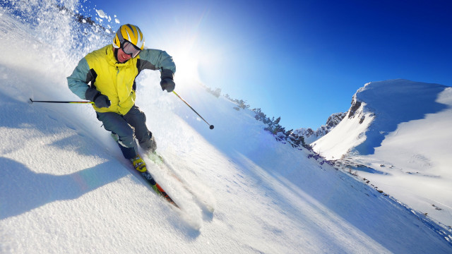 Man skiing snowy slope sunny #2 free wallpaper for desktop - medium preview image