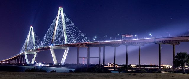 Night lit bridge cityscape starry free wallpaper for desktop - medium preview image