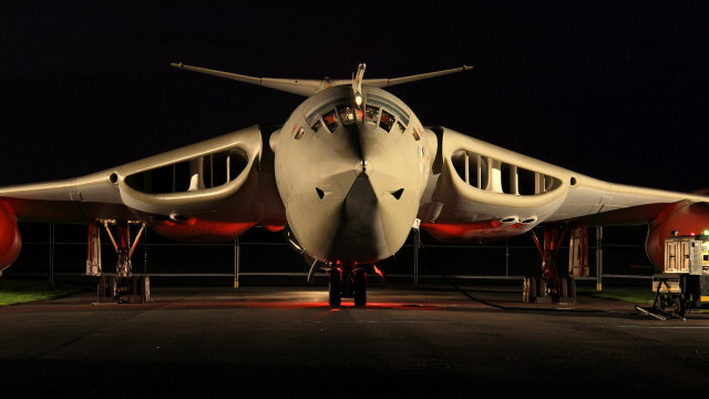 Large airplane runway night man free wallpaper for desktop - medium preview image