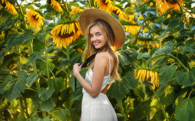 Woman hat sunflowers smiling portrait free wallpaper for desktop - medium preview image