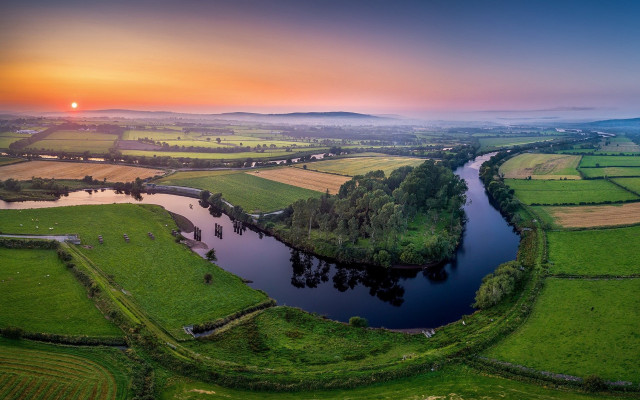 Lush green river sunset landscape free wallpaper for desktop - medium preview image