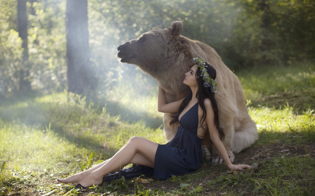 Woman bear forest sunlight enchanting free wallpaper for desktop - medium preview image