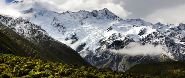 Mountain range cloudy sky forest free wallpaper for desktop - medium preview image