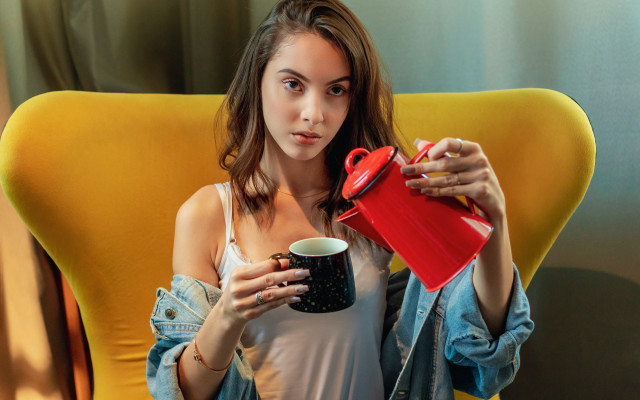 Woman yellow chair red mug free wallpaper for desktop - medium preview image