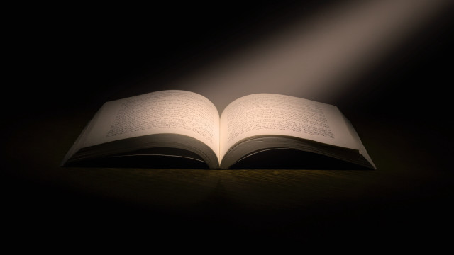 Open book light on table free wallpaper for desktop - medium preview image