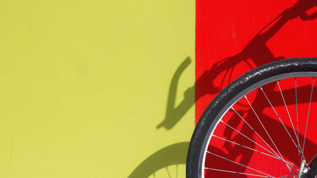 Bike shadow wall red yellow free wallpaper for desktop - medium preview image