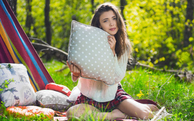 Woman sitting pillow outdoors nature free wallpaper for desktop - medium preview image
