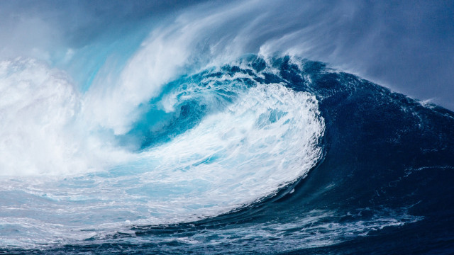 Large wave crashing ocean boat free wallpaper for desktop - medium preview image
