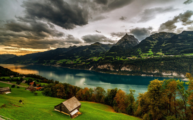 Scenic lake mountains hut cloudy free wallpaper for desktop - medium preview image