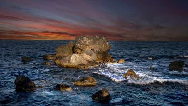 Rock formation ocean sunset island free wallpaper for desktop - medium preview image