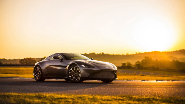 Silver sports car sunset road free wallpaper for desktop - medium preview image