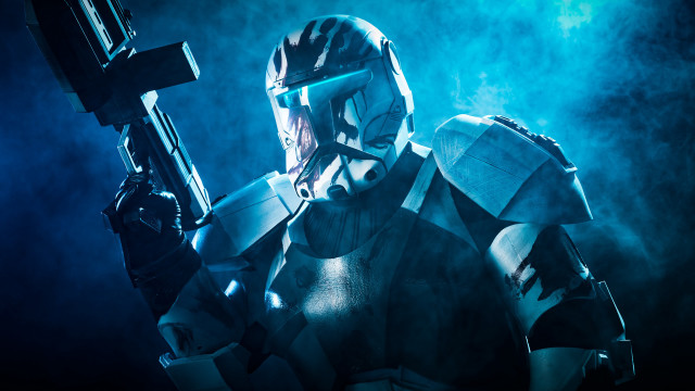 Futuristic man helmet robot gun free wallpaper for desktop - medium preview image
