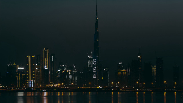 City skyline night tower reflecting free wallpaper for desktop - medium preview image