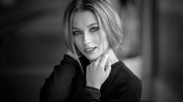 Blonde woman black sweater portrait free wallpaper for desktop - medium preview image