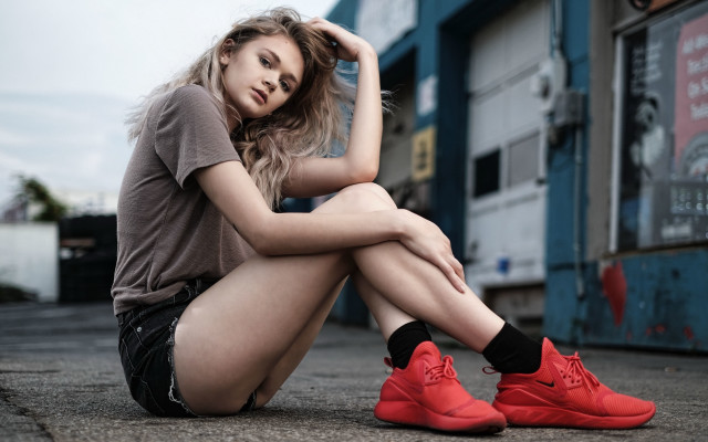 Woman sitting red shoes portrait free wallpaper for desktop - medium preview image