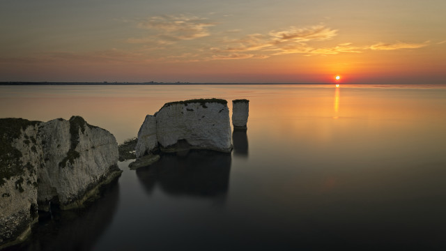 Sunset water rocks island gradient free wallpaper for desktop - medium preview image